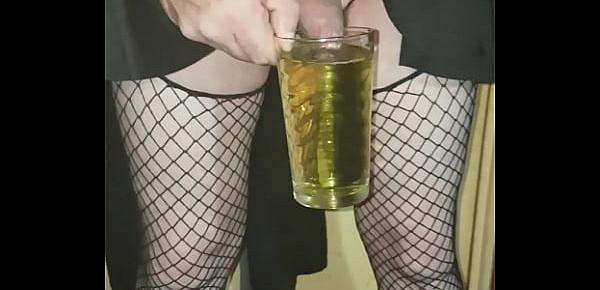  crossdressing sissy drinks his own piss and swollows the lot